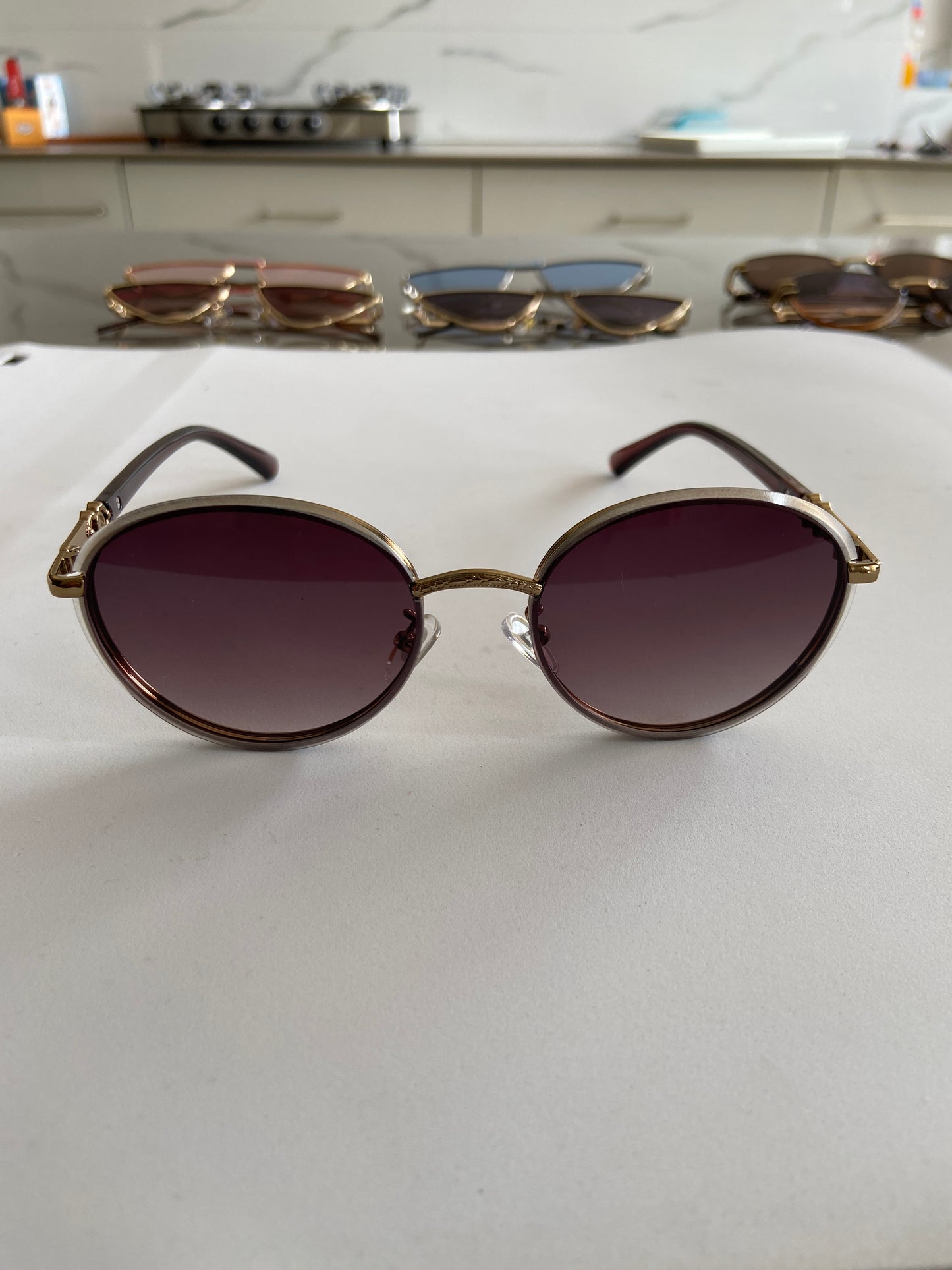 Brown round metal rim sunglasses