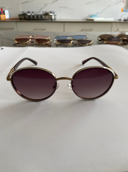 Brown round metal rim sunglasses